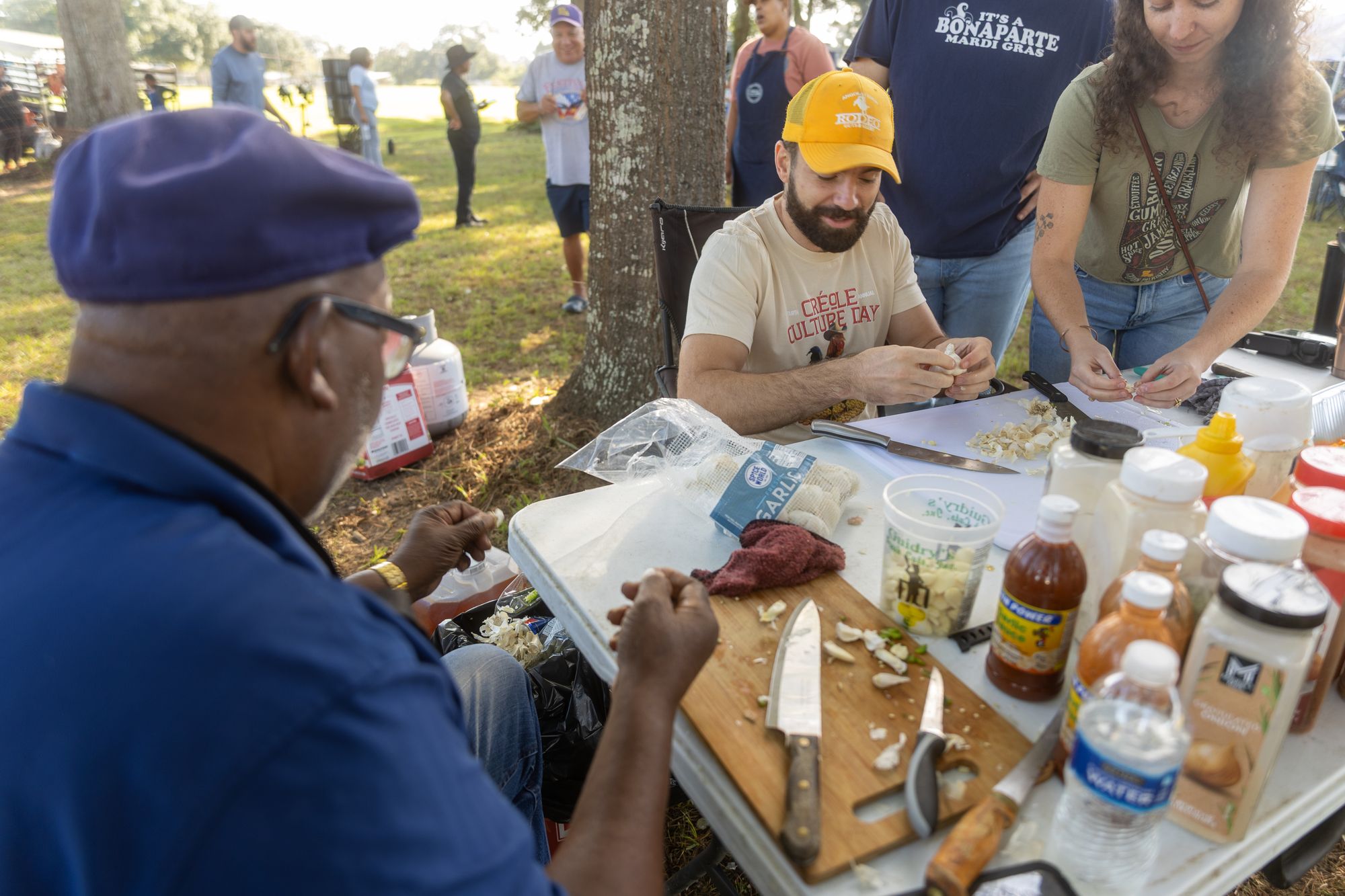 Creole elders gathered at a table in Grand Coteau