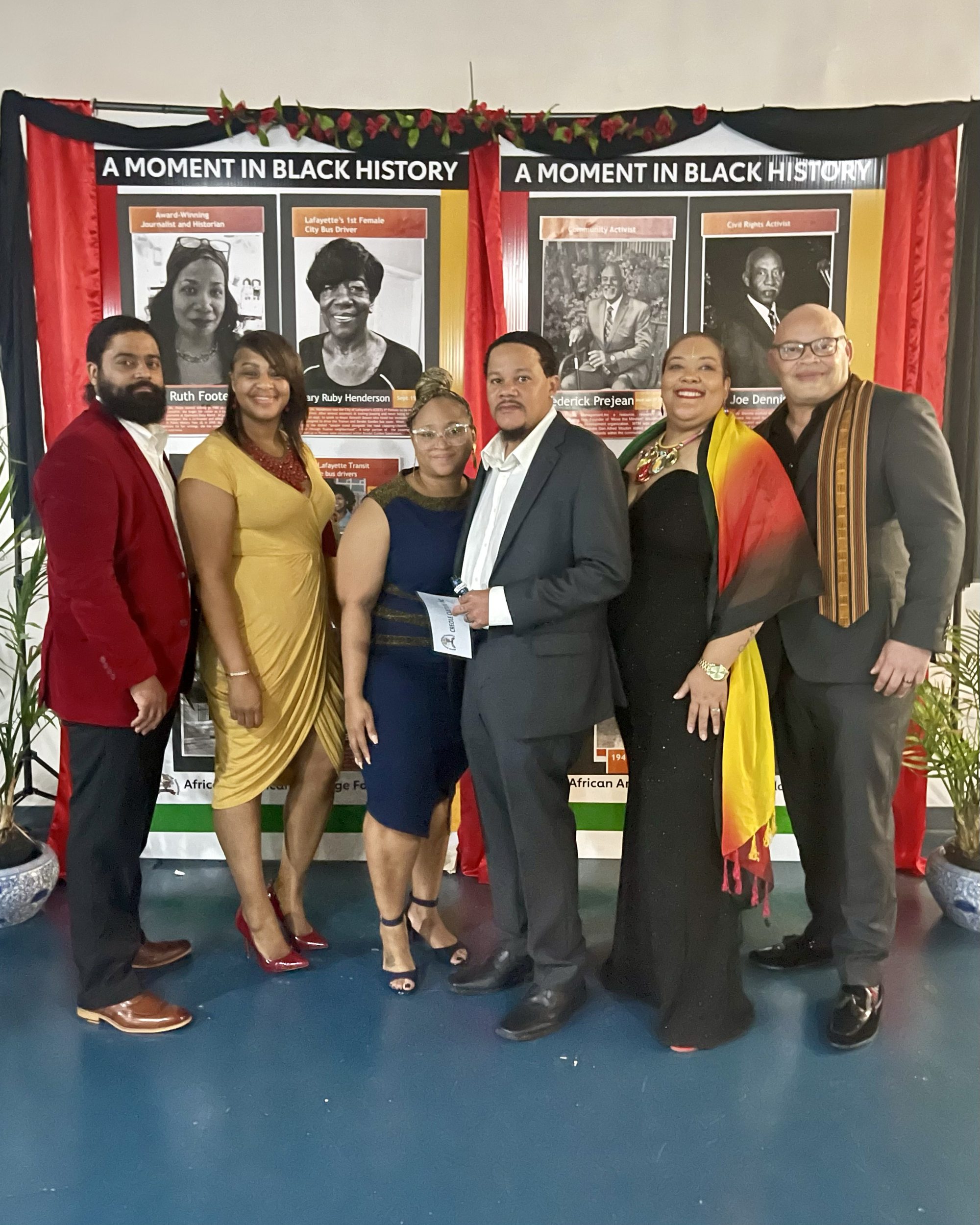 The founders of Louisiana Creole Culture with their wives at a Black history exhibit